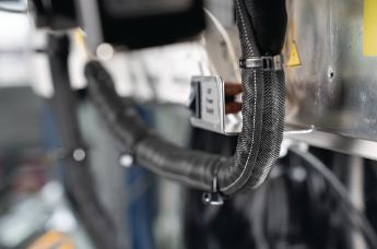 Helagaine Twist-In-FR zelfsluitende, vlamvertragende polyester gevlochten kous